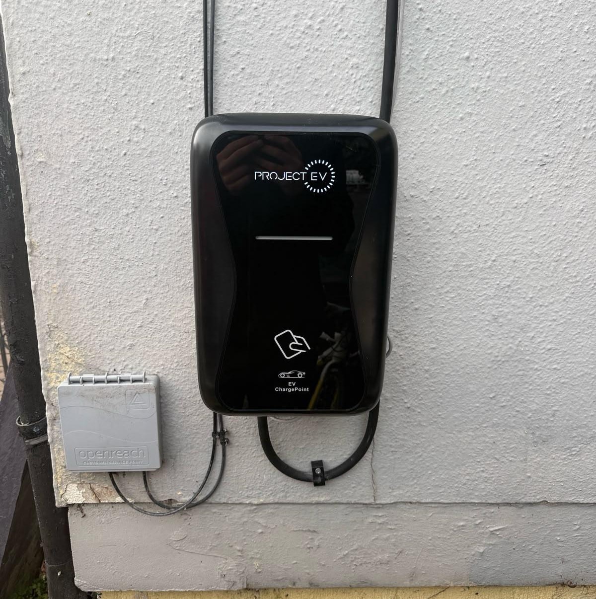 EV charger mounted on an exterior wall