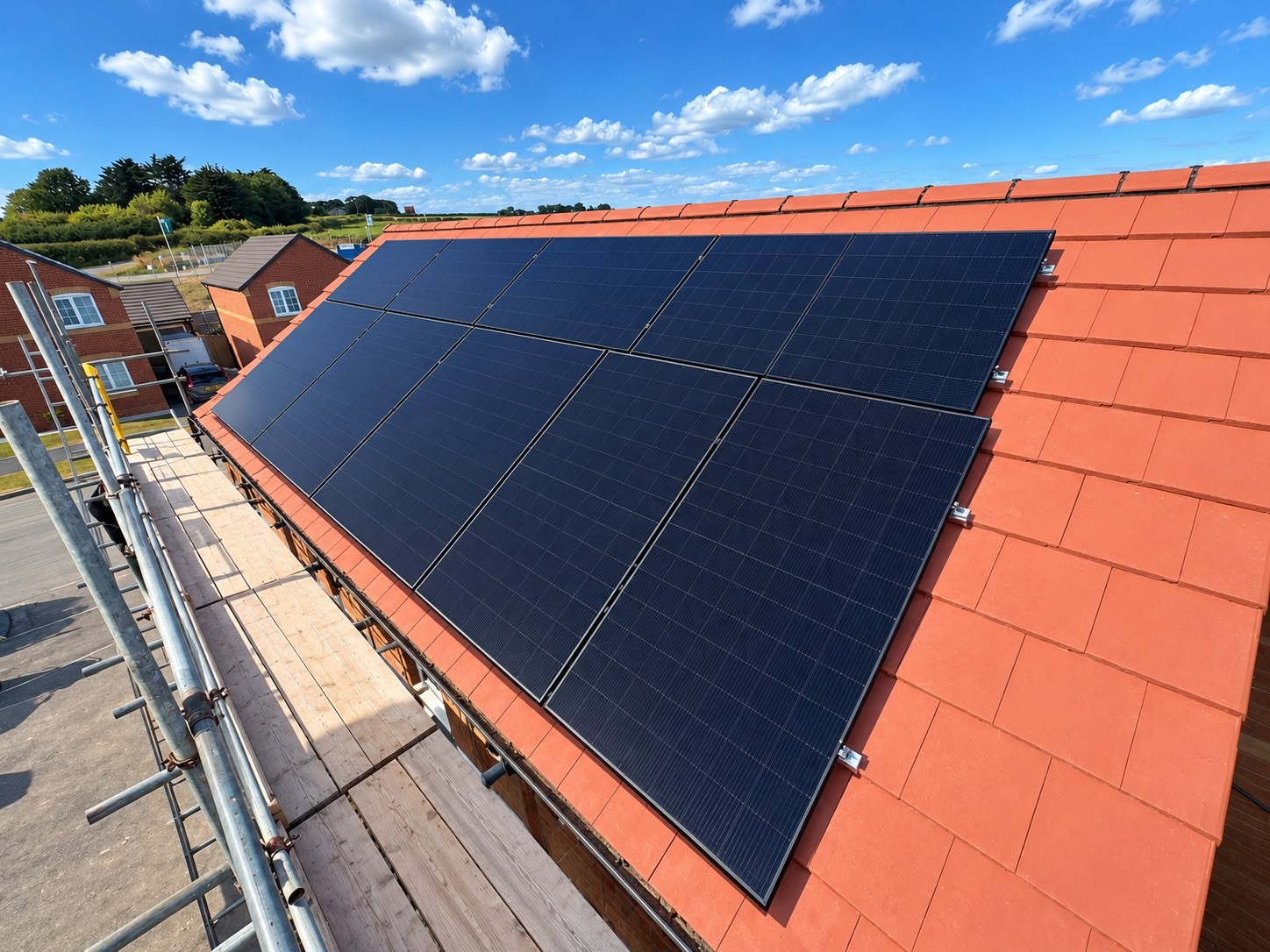 Domestic solar panel installation on a red tiled roof by Zealous Electrical